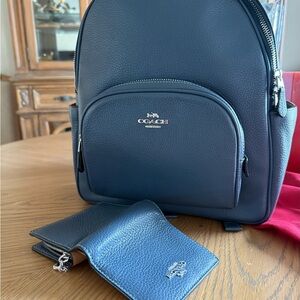 Coach Navy Leather Backpack.  Matching wallet for additional price.